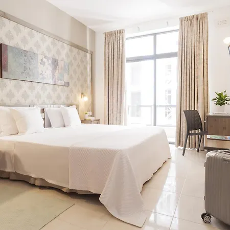By Alexandra Hotel Saint Julian's